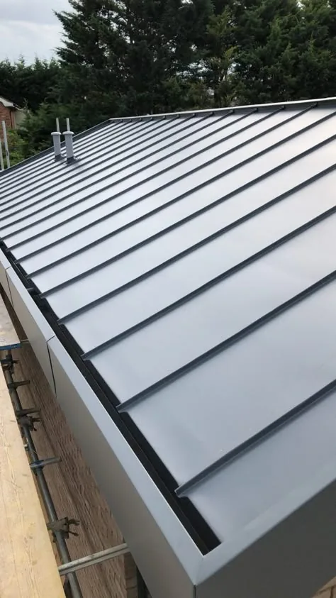 Dark grey standing-seam metal roof in Gloucester
